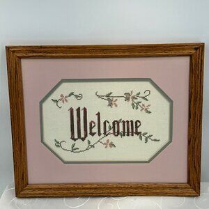 Handmade Welcome Cross-Stitch Framed In Oak Wood With Pink Matte Accent